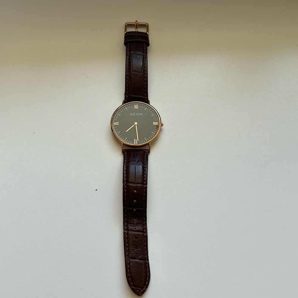 Men’s AEON watch with brown leather wrist. Great Condition.